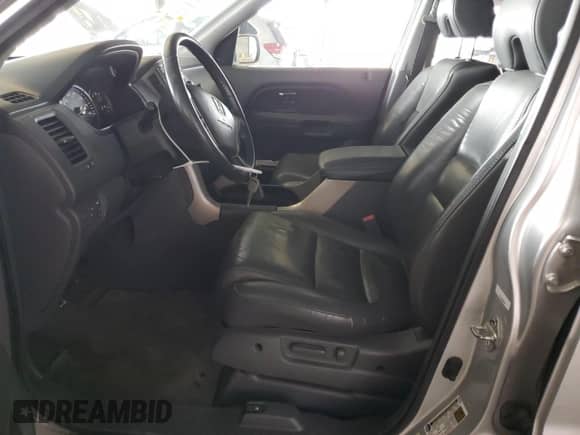 2006 Honda Pilot EX-L z VIN 5FNYF28556B014645, wystawiony jako Copart lot #86682445 z przebiegiem 216 000 mil mil oraz Szkoda całkowita • Salvage title. Historia ofert i sprzedaży dostępna na DreamBid. Obrazek 7.