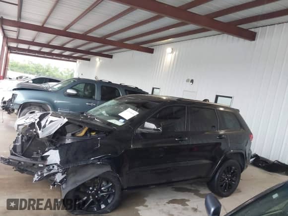 2020 Jeep Grand Cherokee Altitude with VIN 1C4RJEAGXLC392047, listed as a IAAI auction lot 42371691 with 118,569 mi miles and . Bid and sale history available at DreamBid. Image 15.