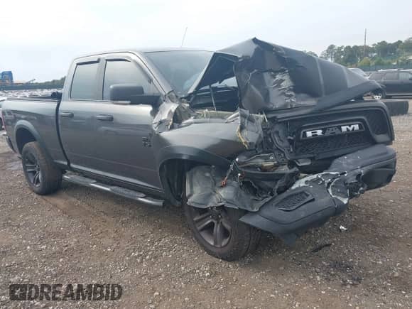 2021 Ram 1500 Warlock z VIN 1C6RR7GG1MS523909, wystawiony jako IAAI lot #43232102 z przebiegiem 71 910 mil mil oraz . Historia ofert i sprzedaży dostępna na DreamBid. Obrazek 1.