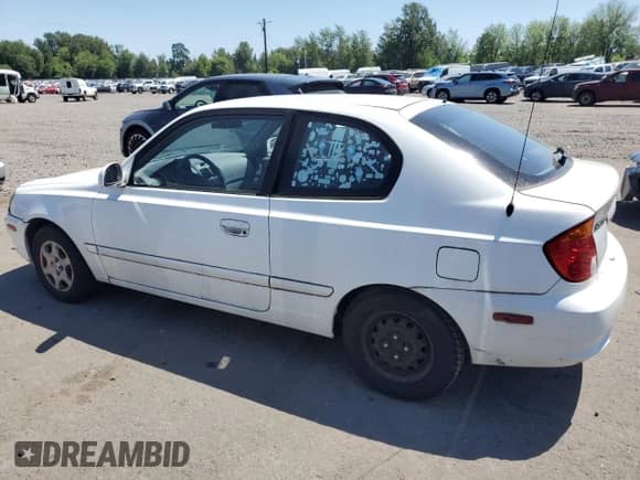 2005 Hyundai Accent GLS с VIN KMHCG35C75U353506, выставлен на аукционе Copart как лот 63022545 с пробегом 143 246 миль миль и Списание • Salvage title. История ставок и продаж доступна на DreamBid. Изображение 2.