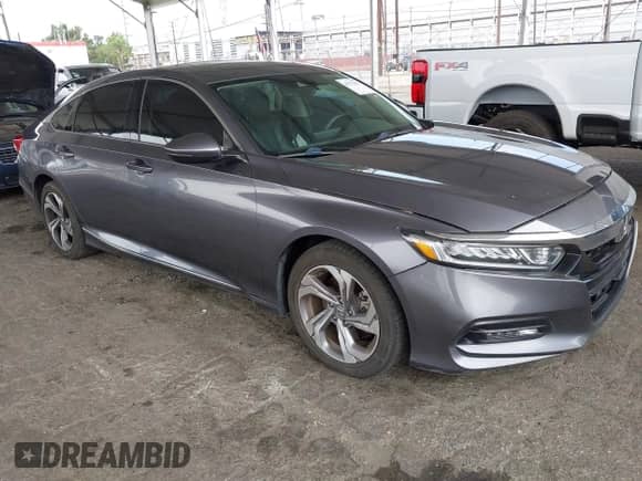 2018 Honda Accord EX-L with VIN 1HGCV2F57JA021566, listed as a IAAI auction lot 42772915 with 132,552 mi miles and . Bid and sale history available at DreamBid. Image 1.