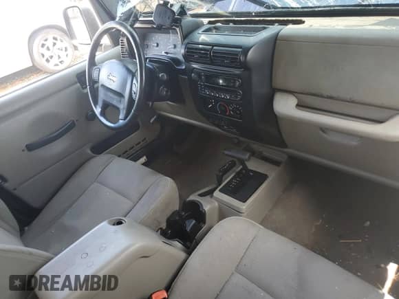 2006 Jeep Wrangler Sport z VIN 1J4FA49S46P710371, wystawiony jako Copart lot #63701095 z przebiegiem 110 750 mil mil oraz Szkoda całkowita • Salvage title. Historia ofert i sprzedaży dostępna na DreamBid. Obrazek 8.