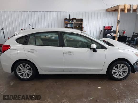 2016 Subaru Impreza Premium z VIN JF1GPAB63G8273405, wystawiony jako IAAI lot #42795751 z przebiegiem 124 711 mil mil oraz . Historia ofert i sprzedaży dostępna na DreamBid. Obrazek 14.