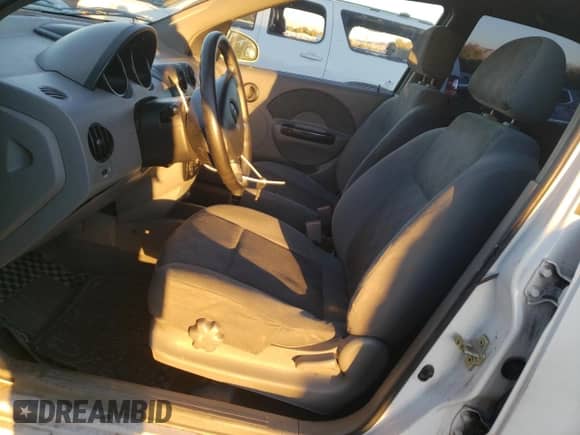 2005 Chevrolet Aveo LS z VIN KL1TD52665B331166, wystawiony jako Copart lot #79510054 z przebiegiem 165 471 mil mil oraz Szkoda całkowita • Salvage title. Historia ofert i sprzedaży dostępna na DreamBid. Obrazek 7.