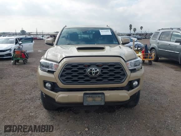 2020 Toyota Tacoma SR5 z VIN 3TMBZ5DN5LM026533, wystawiony jako IAAI lot #41529069 z przebiegiem 87 710 mil mil oraz . Historia ofert i sprzedaży dostępna na DreamBid. Obrazek 12.