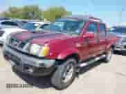 2000 Nissan Frontier XE with VIN 1N6ED27T3YC375054, listed as a IAAI auction lot 41873026 with 287,604 mi miles and . Bid and sale history available at DreamBid. Image 2.