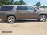 2015 Chevrolet Suburban LT with VIN 1GNSCJKC0FR513631, listed as a IAAI auction lot 42879095 with 239,851 mi miles and . Bid and sale history available at DreamBid. Image 13.