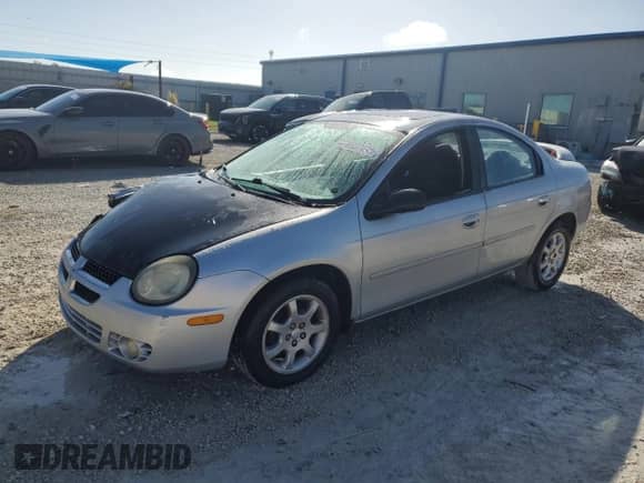 2003 Dodge Neon SXT with VIN 1B3ES56C23D259540, listed as a Copart auction lot 78537494 with 64,927 mi miles and Salvage title. Bid and sale history available at DreamBid. Image 1.