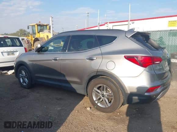 2018 Hyundai Santa Fe 2.4L with VIN 5XYZUDLB0JG570723, listed as a IAAI auction lot 43233197 with 81,248 mi miles and . Bid and sale history available at DreamBid. Image 14.