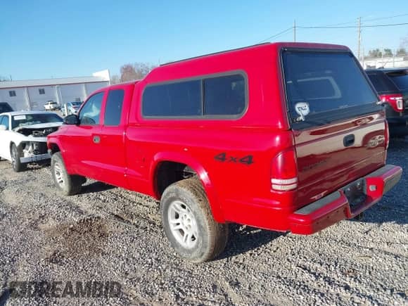 2004 Dodge Dakota with VIN 1D7HG12K54S635122, listed as a IAAI auction lot 41876308 with Not provided miles and . Bid and sale history available at DreamBid. Image 3.