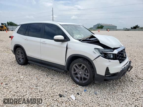 2022 Honda Passport EX-L with VIN 5FNYF7H56NB004055, listed as a Copart auction lot 59491315 with 56,500 mi miles and Salvage title. Bid and sale history available at DreamBid. Image 4.