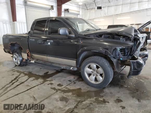2005 Dodge 1500 SLT z VIN 1D7HU18D25S174299, wystawiony jako Copart lot #70717735 z przebiegiem 181 789 mil mil oraz Szkoda całkowita • Salvage title. Historia ofert i sprzedaży dostępna na DreamBid. Obrazek 4.
