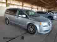 2014 Dodge Grand Caravan SXT with VIN 2C4RDGCG8ER352298, listed as a Copart auction lot 90287805 with 154,922 mi miles and Salvage title. Bid and sale history available at DreamBid. Image 4.