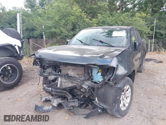 2018 Chevrolet Colorado 4WD LT with VIN 1GCGTCEN2J1148884, listed as a IAAI auction lot 43001742 with 97,894 mi miles and . Bid and sale history available at DreamBid. Image 2.