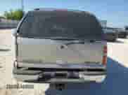 2000 Chevrolet Suburban LT with VIN 3GNFK16T7YG202151, listed as a Copart auction lot 60194814 with Not provided miles and Salvage title. Bid and sale history available at DreamBid. Image 6.