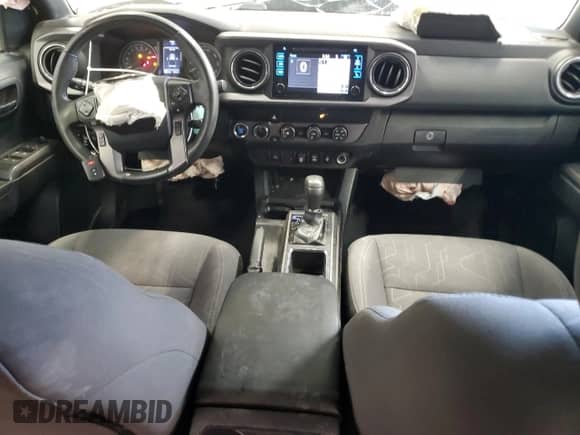 2019 Toyota Tacoma SR5 с VIN 3TMDZ5BN7KM070608, выставлен на аукционе Copart как лот 80529235 с пробегом 92 918 миль миль и Списание • Salvage title. История ставок и продаж доступна на DreamBid. Изображение 8.