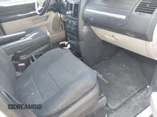 2009 Dodge Grand Caravan SE with VIN 2D8HN44E19R575827, listed as a IAAI auction lot 42812571 with 165,084 mi miles and . Bid and sale history available at DreamBid. Image 5.