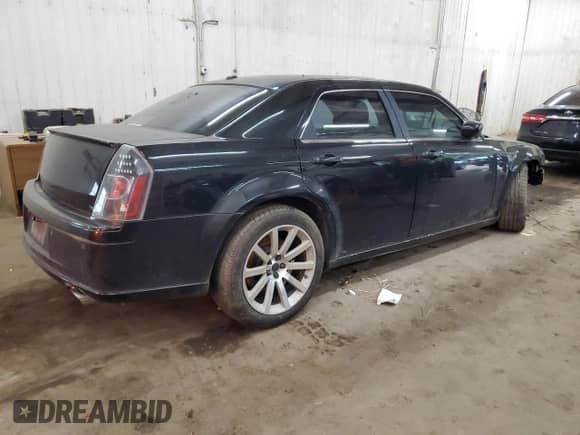 2006 Chrysler 300 C SRT-8 z VIN 2C3LA73W86H340377, wystawiony jako Copart lot #68520435 z przebiegiem 97 573 mil mil oraz Szkoda całkowita • Salvage title. Historia ofert i sprzedaży dostępna na DreamBid. Obrazek 3.