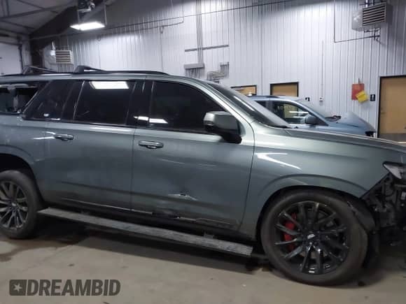 2024 Cadillac Escalade with VIN 1GYS4RKT7RR230923, listed as a IAAI auction lot 41073003 with 9,513 mi miles and . Bid and sale history available at DreamBid. Image 13.
