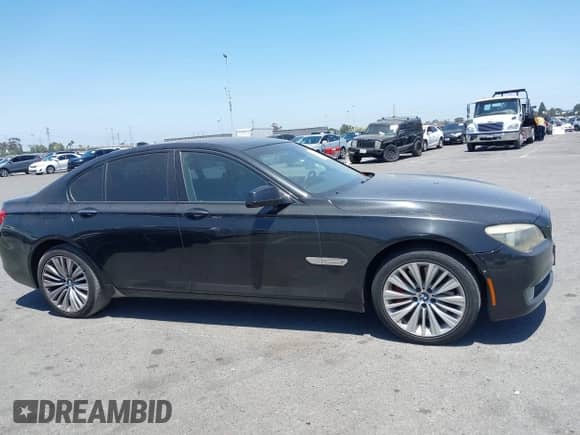 2009 BMW 7 Series 750i with VIN WBAKA83509CY34015, listed as a IAAI auction lot 42466113 with 184,076 mi miles and . Bid and sale history available at DreamBid. Image 13.
