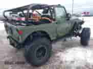2015 Jeep Wrangler Rubicon Hard Rock z VIN 1C4BJWCG3FL586170, wystawiony jako IAAI lot #41218838 z przebiegiem Nie podano mil oraz . Historia ofert i sprzedaży dostępna na DreamBid. Obrazek 4.