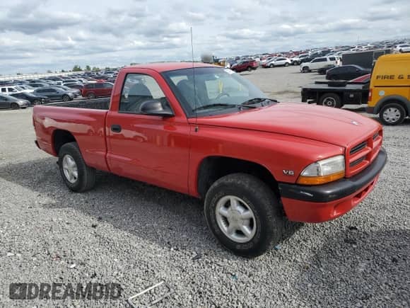 1999 Dodge Dakota z VIN 1B7GG26XXXS211490, wystawiony jako Copart lot #53779955 z przebiegiem 146 012 mil mil oraz Szkoda całkowita • Salvage title. Historia ofert i sprzedaży dostępna na DreamBid. Obrazek 4.