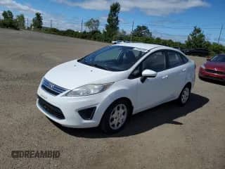 2011 Ford Fiesta SE z VIN 3FADP4BJ2BM239601, wystawiony jako Copart lot #70484235 z przebiegiem 145 671 mil mil oraz Szkoda całkowita • Salvage title. Historia ofert i sprzedaży dostępna na DreamBid. Obrazek 1.