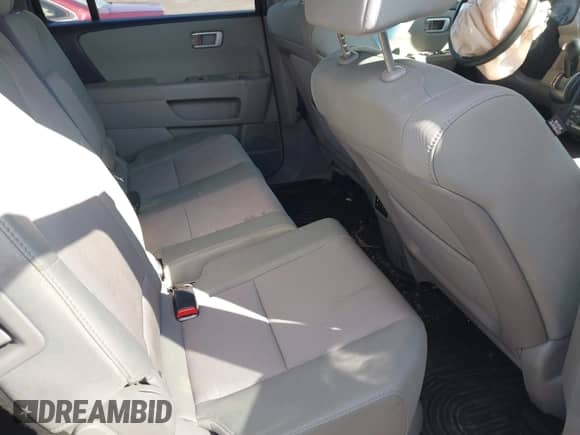 2015 Honda Pilot SE with VIN 5FNYF4H33FB079164, listed as a IAAI auction lot 43207895 with 148,817 mi miles and . Bid and sale history available at DreamBid. Image 8.