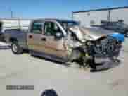 2004 Chevrolet Silverado 2500 LT z VIN 1GCGC23U04F146109, wystawiony jako Copart lot #76325114 z przebiegiem 167 064 mil mil oraz Szkoda całkowita • Salvage title. Historia ofert i sprzedaży dostępna na DreamBid. Obrazek 4.