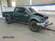 2003 Toyota Tacoma PreRunner with VIN 5TESM92N43Z251344, listed as a Copart auction lot 86184425 with 194,763 mi miles and Salvage title. Bid and sale history available at DreamBid. Image 4.