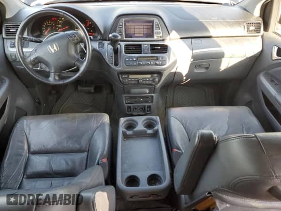 2007 Honda Odyssey EX-L с VIN 5FNRL38707B077318, выставлен на аукционе Copart как лот 71250165 с пробегом 174 272 миль миль и Списание • Salvage title. История ставок и продаж доступна на DreamBid. Изображение 8.