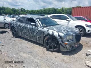 2006 Chrysler 300 C SRT-8 with VIN 2C3LA73W46H216929, listed as a IAAI auction lot 42660806 with 202,363 mi miles and . Bid and sale history available at DreamBid. Image 1.