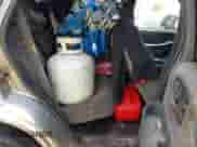 2002 Chevrolet Blazer LS z VIN 1GNDT13W92K219018, wystawiony jako IAAI lot #42967417 z przebiegiem 162 926 mil mil oraz . Historia ofert i sprzedaży dostępna na DreamBid. Obrazek 8.