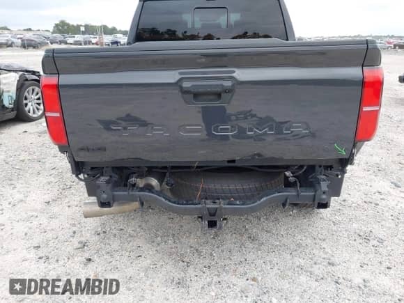 2024 Toyota Tacoma TRD Off Road with VIN 3TMLB5JN9RM060836, listed as a IAAI auction lot 43181595 with 21,563 mi miles and . Bid and sale history available at DreamBid. Image 6.
