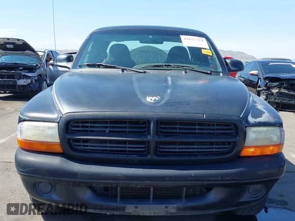 2000 Dodge Dakota with VIN 1B7GL22X5YS533537, listed as a IAAI auction lot 42672321 with 104,070 mi miles and . Bid and sale history available at DreamBid. Image 12.