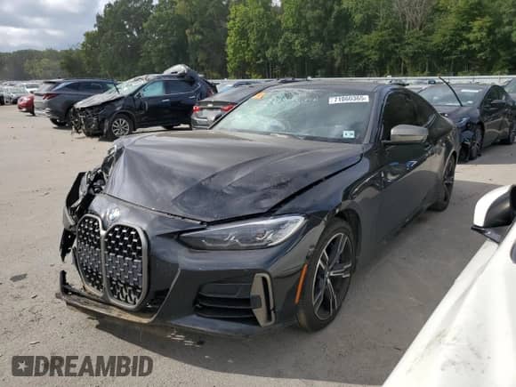 2021 BMW 4 Series M440i xDrive с VIN WBA13AR02MCG26285, выставлен на аукционе Copart как лот 71060365 с пробегом 84 715 миль миль и Списание • Salvage title. История ставок и продаж доступна на DreamBid. Изображение 1.