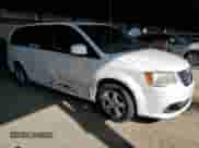 2011 Dodge Grand Caravan Mainstreet with VIN 2D4RN3DG6BR742139, listed as a Copart auction lot 71022515 with 126,565 mi miles and Salvage title. Bid and sale history available at DreamBid. Image 4.