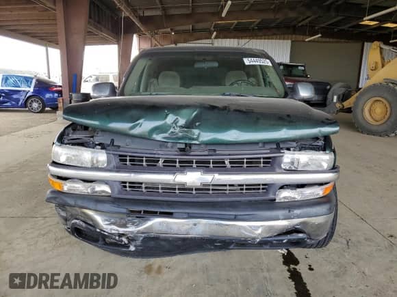 2001 Chevrolet Silverado 1500 with VIN 2GCEC19W411137247, listed as a Copart auction lot 54449525 with 253,035 mi miles and Salvage title. Bid and sale history available at DreamBid. Image 5.