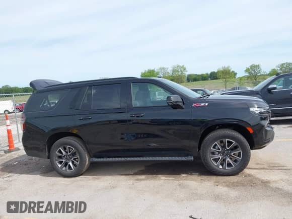 2023 Chevrolet Tahoe Z71 with VIN 1GNSKPKDXPR478645, listed as a IAAI auction lot 42674376 with 39,039 mi miles and . Bid and sale history available at DreamBid. Image 14.