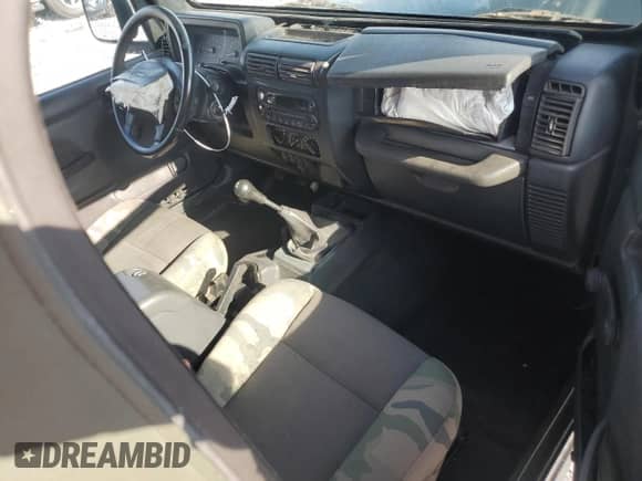 2005 Jeep Wrangler X z VIN 1J4FA39S05P312454, wystawiony jako Copart lot #68435425 z przebiegiem 82 660 mil mil oraz Szkoda całkowita • Salvage title. Historia ofert i sprzedaży dostępna na DreamBid. Obrazek 8.