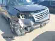 2014 Honda Pilot EX-L with VIN 5FNYF3H58EB008925, listed as a IAAI auction lot 43189141 with 132,910 mi miles and . Bid and sale history available at DreamBid. Image 6.