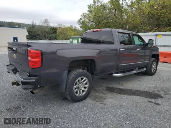 2015 Chevrolet Silverado 3500 с VIN 1GC4K0EG4FF512237, выставлен на аукционе Copart как лот 81611215 с пробегом 143 935 миль миль и Списание • Salvage title. История ставок и продаж доступна на DreamBid. Изображение 3.