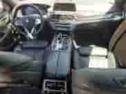 2017 BMW 7 Series 740e xDrive with VIN WBA7J2C34HG497678, listed as a Copart auction lot 55715124 with 40,852 mi miles and . Bid and sale history available at DreamBid. Image 8.