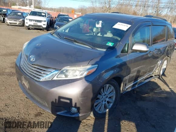 2015 Toyota Sienna Limited with VIN 5TDDK3DC5FS096649, listed as a IAAI auction lot 41292478 with 234,298 mi miles and . Bid and sale history available at DreamBid. Image 2.