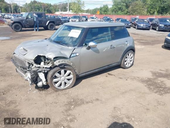 2008 MINI Hardtop S with VIN WMWMF73538TV35556, listed as a IAAI auction lot 43328105 with 113,334 mi miles and . Bid and sale history available at DreamBid. Image 2.
