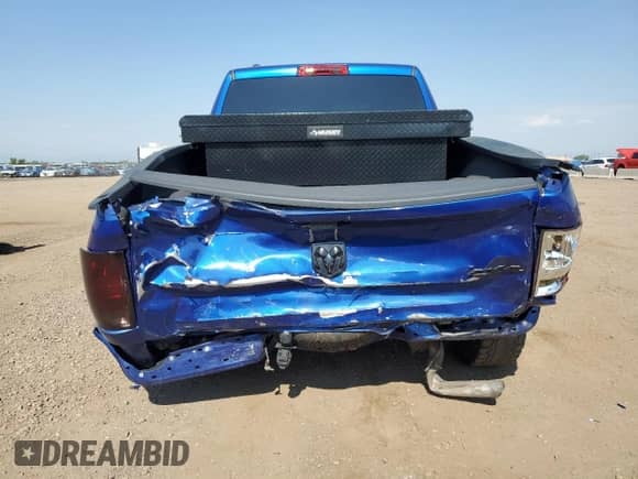 2018 Ram 1500 Tradesman z VIN 1C6RR7FG7JS235759, wystawiony jako Copart lot #65409575 z przebiegiem 93 728 mil mil oraz Szkoda całkowita • Salvage title. Historia ofert i sprzedaży dostępna na DreamBid. Obrazek 6.