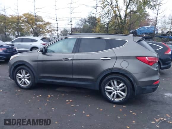 2013 Hyundai Santa Fe Sport с VIN 5XYZUDLA1DG012889, выставлен на аукционе IAAI как лот 43454462 с пробегом 195 058 миль миль и . История ставок и продаж доступна на DreamBid. Изображение 14.