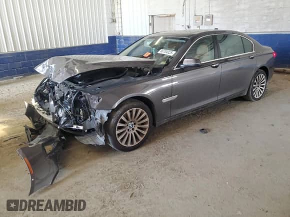 2014 BMW 7 Series 740Li with VIN WBAYE4C55ED137855, listed as a Copart auction lot 66704025 with 112,827 mi miles and Salvage title. Bid and sale history available at DreamBid. Image 1.