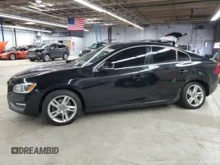 2015 Volvo S60 T5 Drive-E Platinum с VIN YV140MFM7F2348128, выставлен на аукционе Copart как лот 52698615 с пробегом 88 924 миль миль и Списание • Salvage title. История ставок и продаж доступна на DreamBid. Изображение 1.
