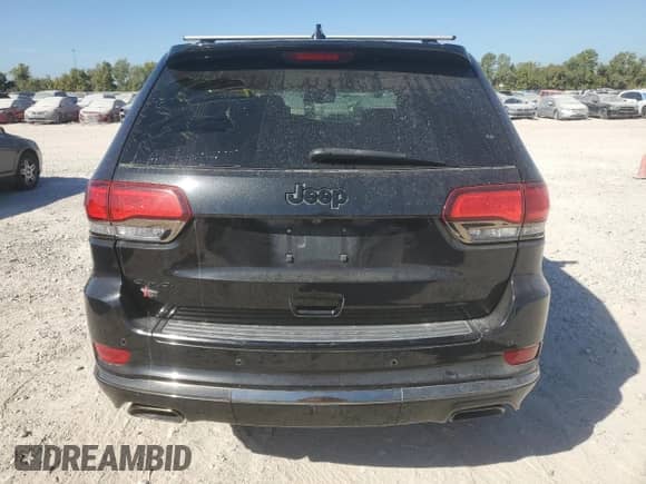 2016 Jeep Grand Cherokee Overland with VIN 1C4RJFCG0GC443824, listed as a Copart auction lot 82598385 with 92,696 mi miles and Salvage title. Bid and sale history available at DreamBid. Image 6.